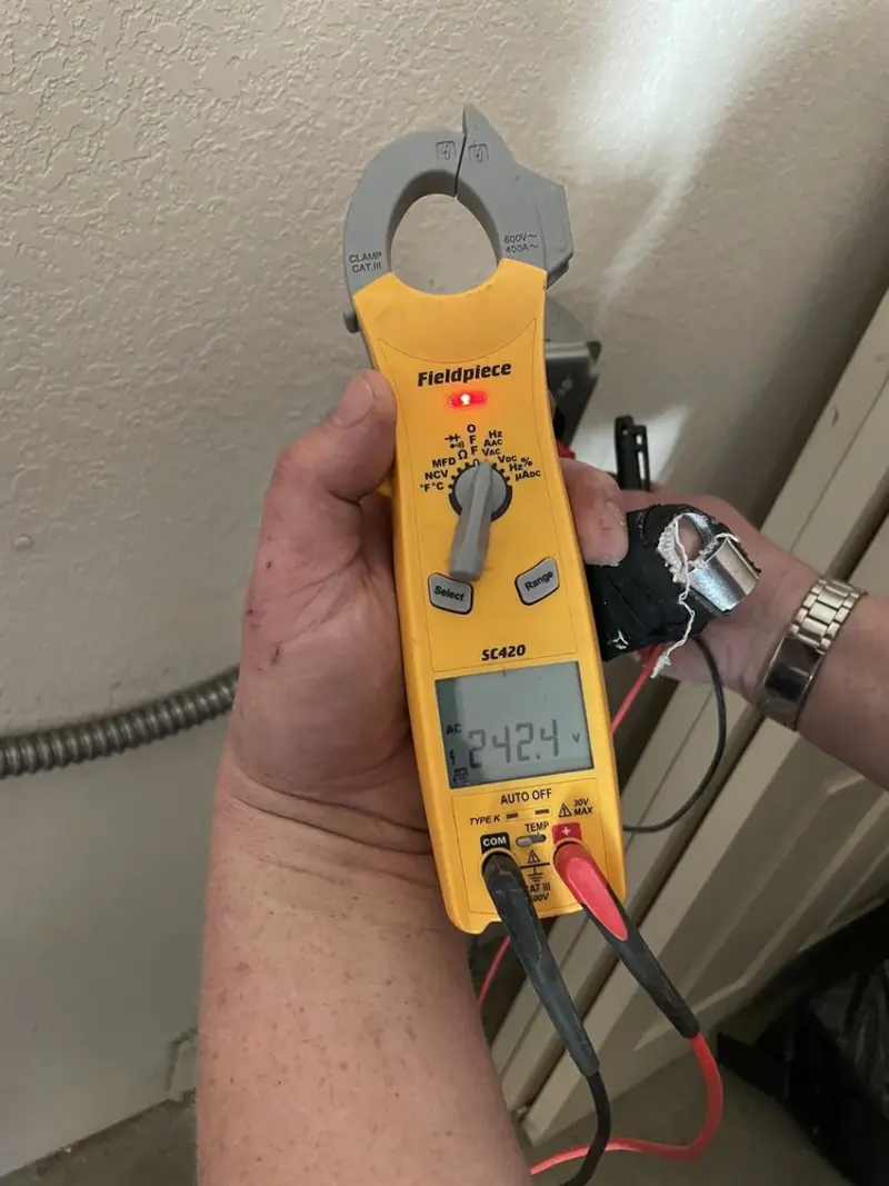 Voltage testing with clamp meter during Generator Installation in Dalton